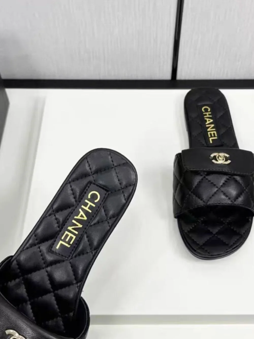 Chanel Black Quilted Lambskin CC Turn‑Lock Flat Slide Sandals